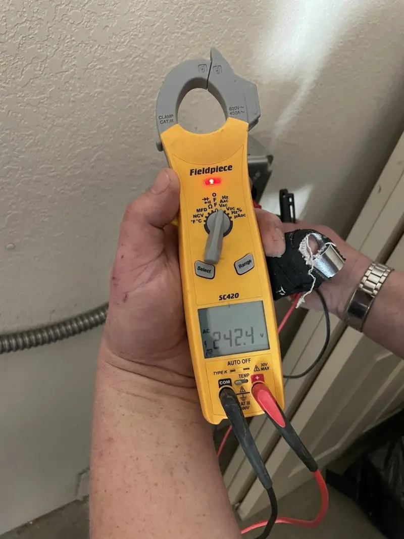 Voltage testing with clamp meter during Generator Installation in Zanesville
